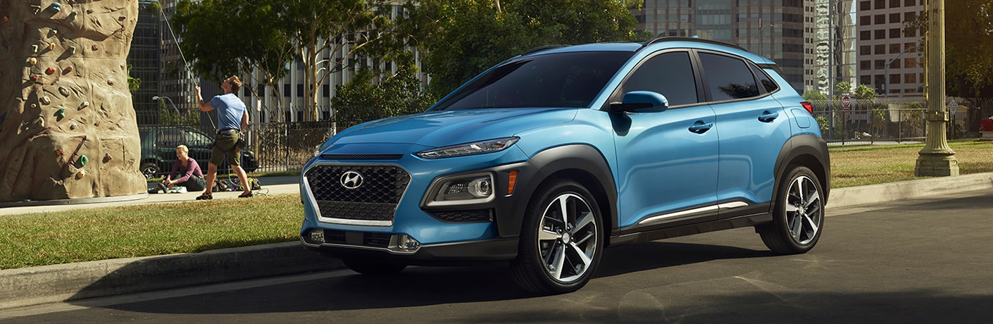 blue hyundai kona side view