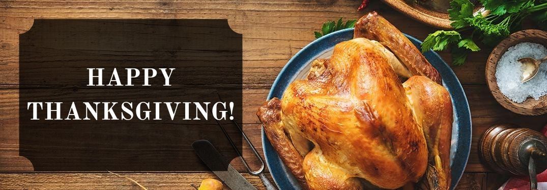 Thanksgiving Turkey on a Table with Black Text Box and White Happy Thanksgiving! Text