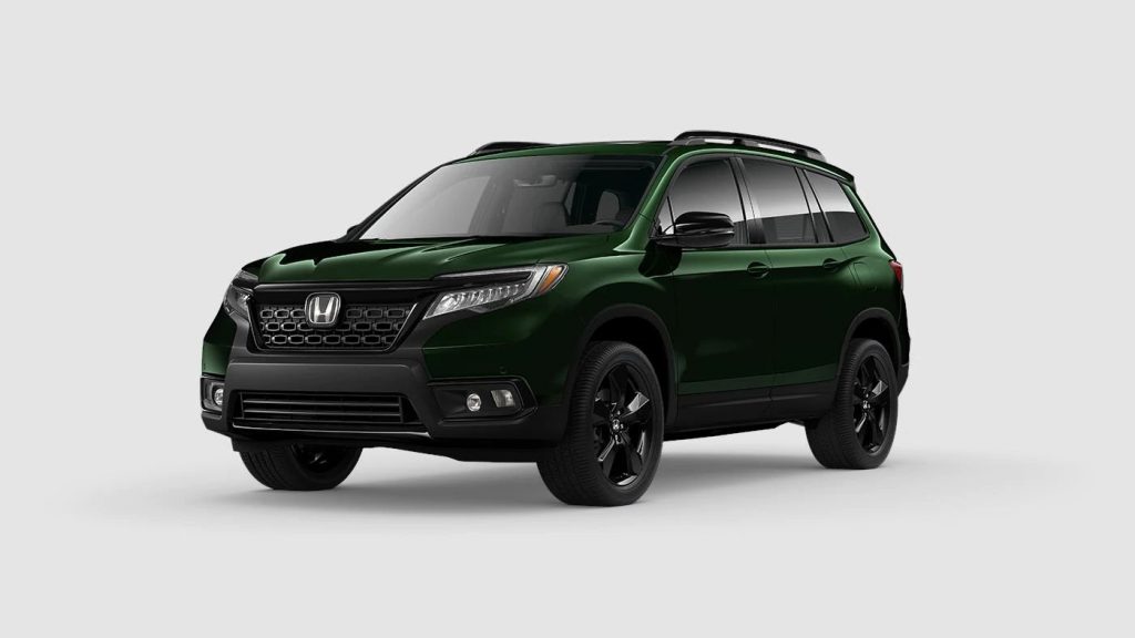 Black Forest Pearl 2020 Honda Passport on Gray Background