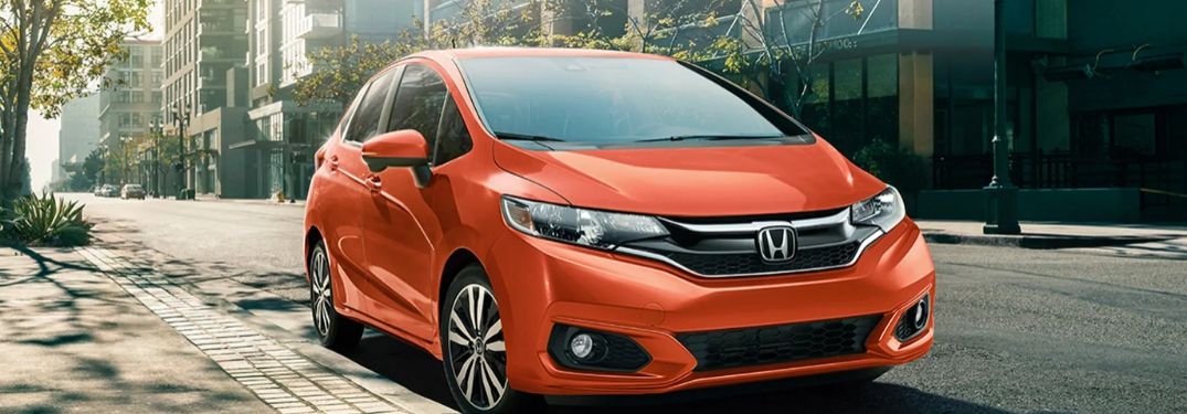 Orange 2020 Honda Fit on a City Street
