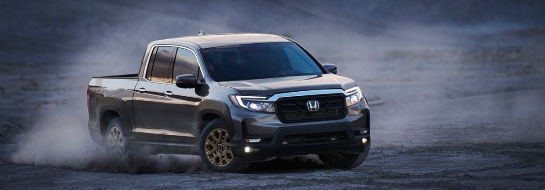 Gray 2021 Honda Ridgeline Driving in a Desert