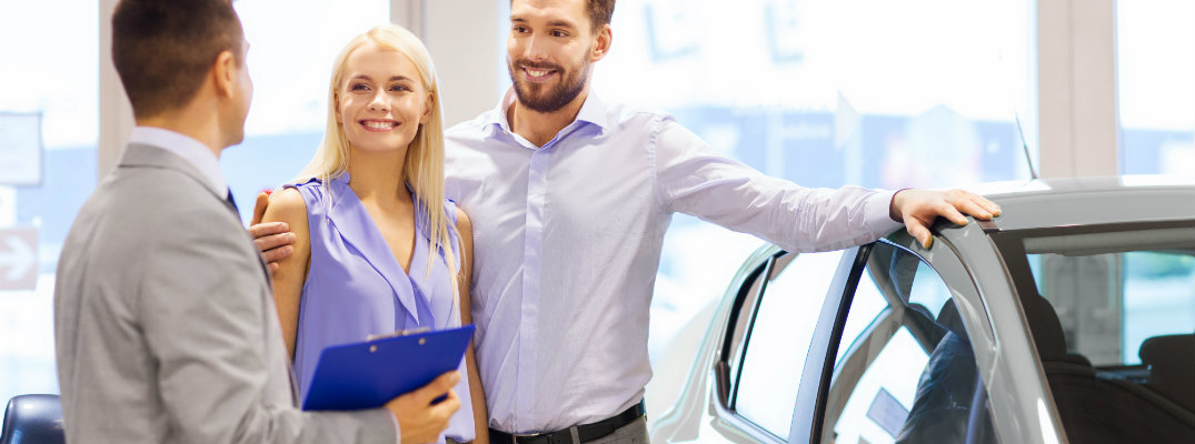Couple shopping at a dealership