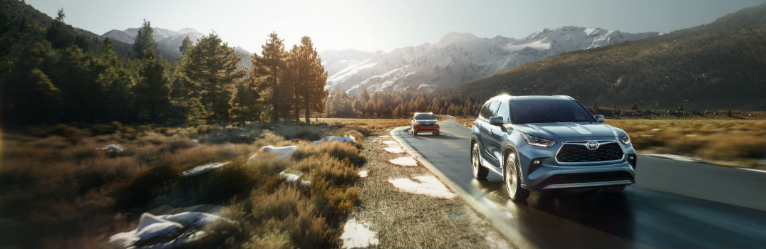 Toyota Highlander Models Traveling on Road