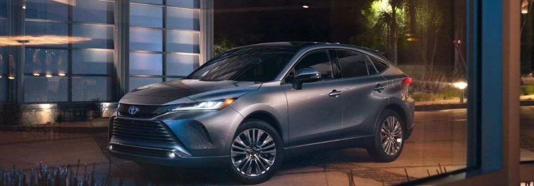 A grey 2022 Toyota Venza outside a building.
