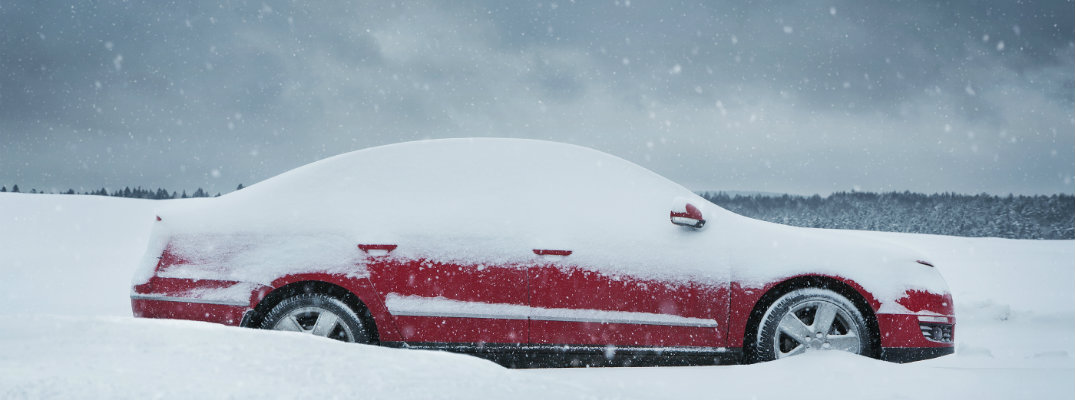 Car covered in snow