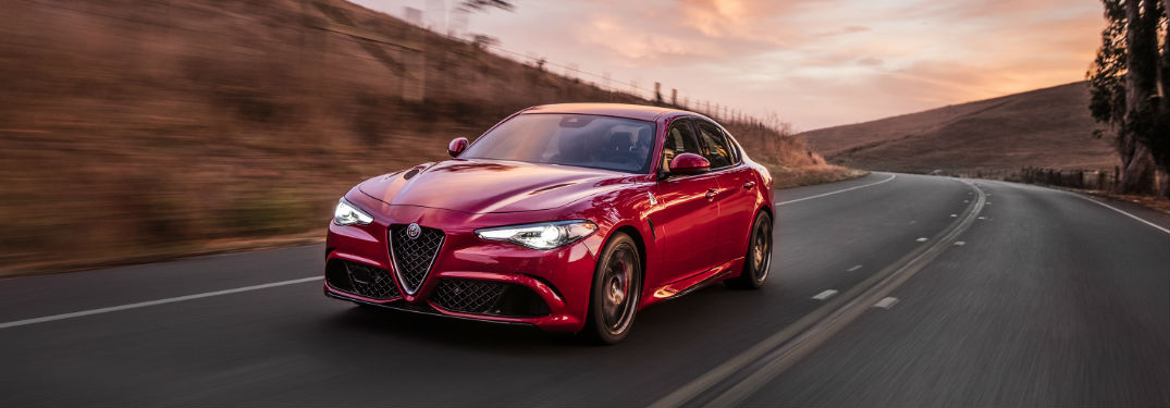 red 2018 Alfa Romeo Giulia Quadrifoglio driving
