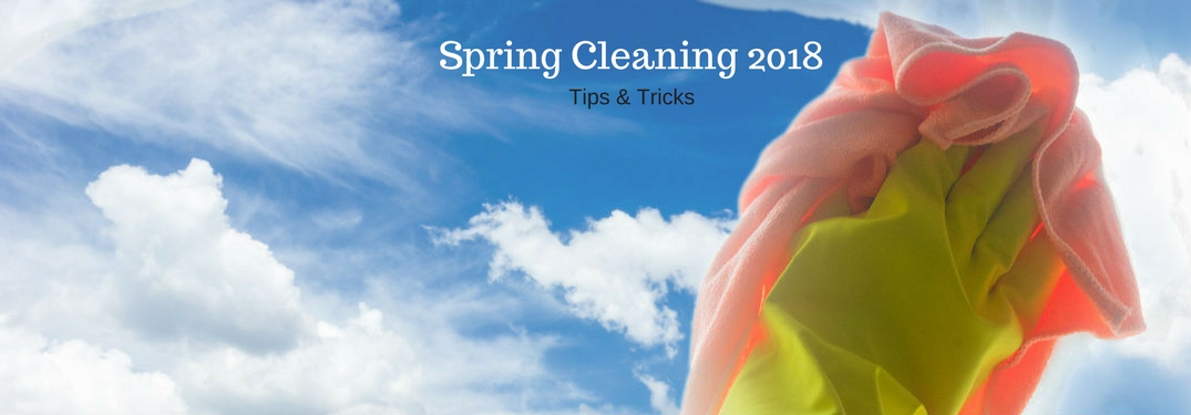 Spring Cleaning 2018 Tips & Tricks, text on an image of yellow rubber-gloved hand wiping a window