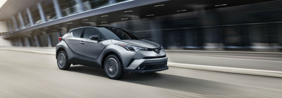 2019 Toyota C-HR exterior front fascia and passenger side going fast on blurred road