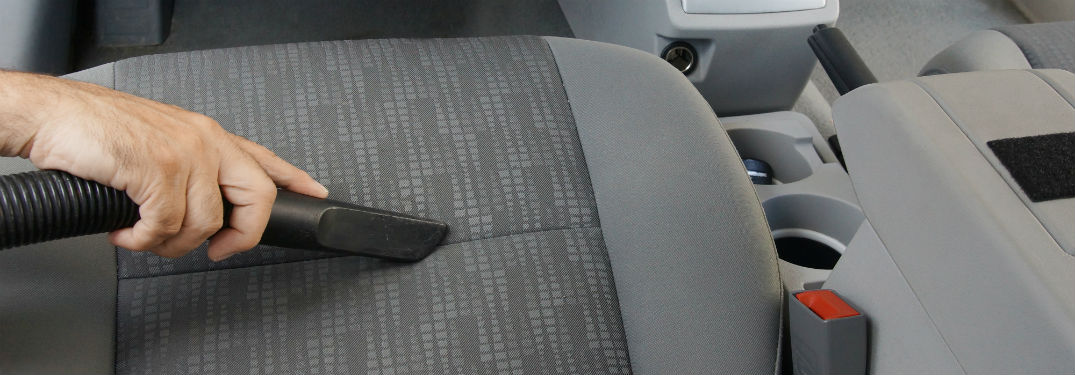 vacuuming seat of car