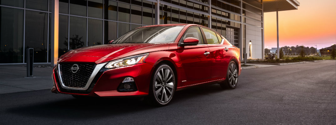 2019 Nissan Altima Edition ONE exterior shot parked outside a dealership at sunrise