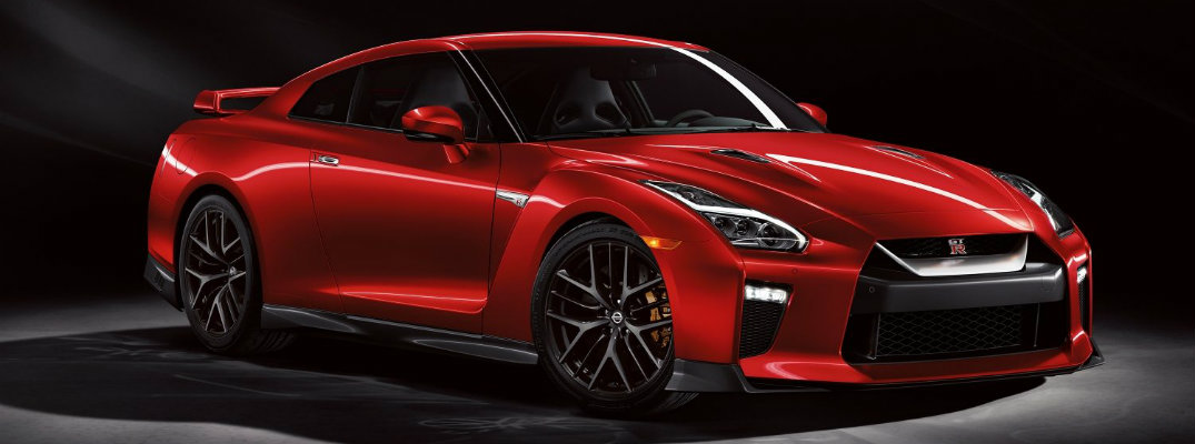 2018 Nissan GT-R luxury sports car red paint color exterior shot in black showcase room