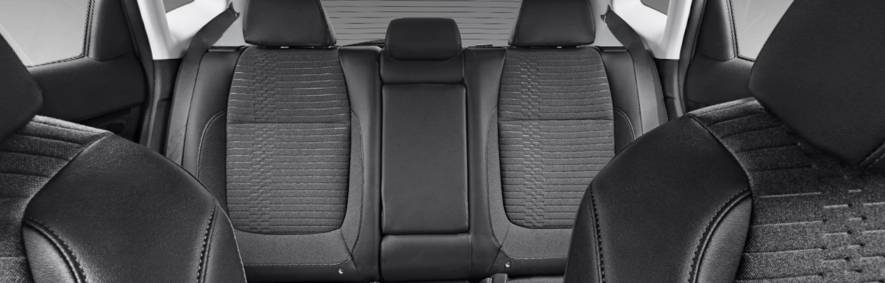 2021KiaSeltosBlackClothandSOFINOwithBlueStitching_o Palmen Kia