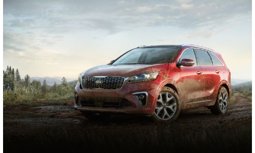 2020 Kia Sorento exterior shot with red paint color splattered and caked with mud