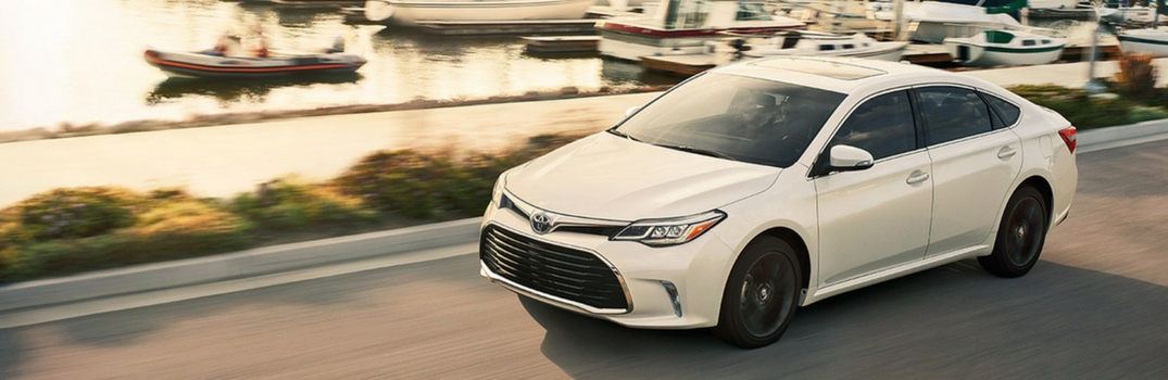 2018 Toyota Avalon driving down that road.