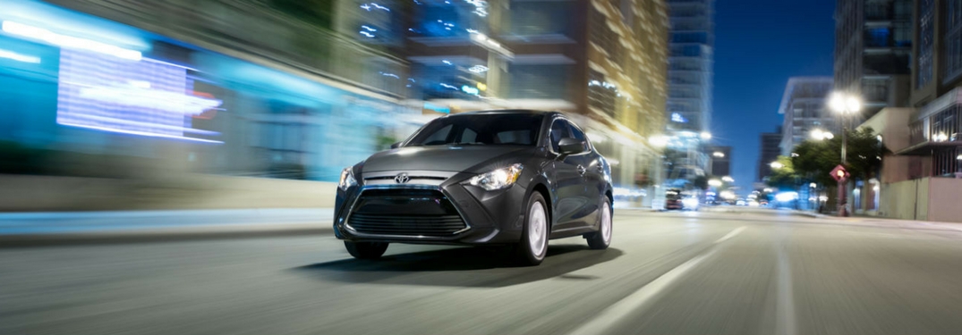 2018 Toyota Yaris iA driving on the road.