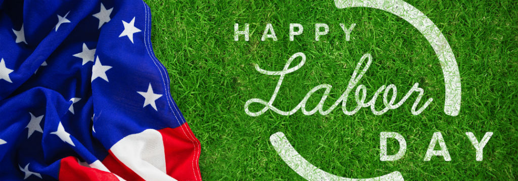 Happy Labor Day, text on green grass next to an image of the American flag