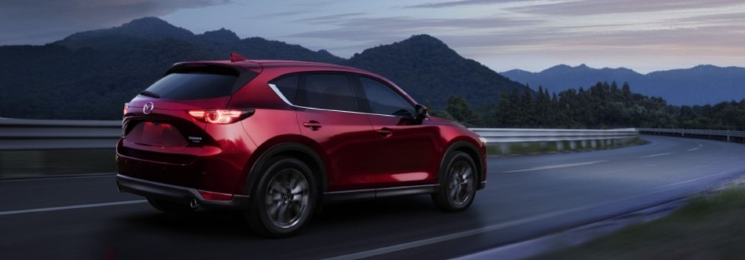 A 2021 Mazda CX-5 driving on a road