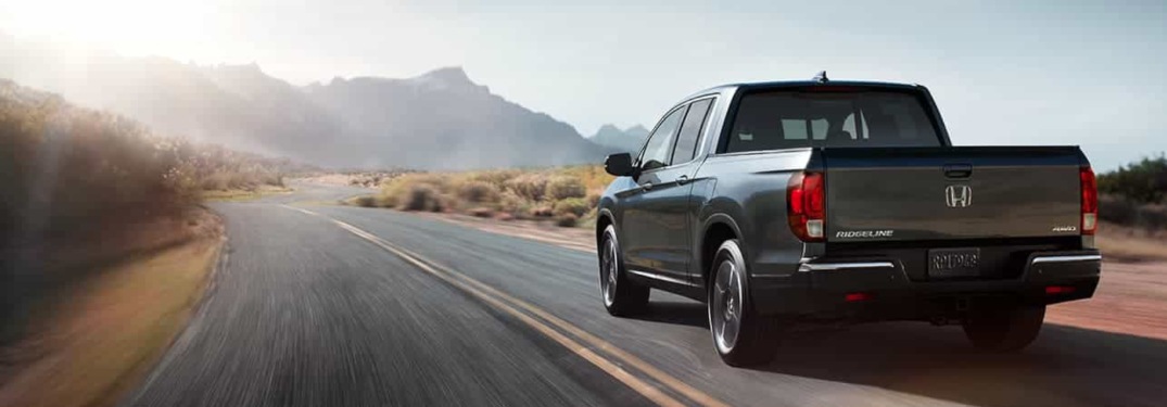 2020 Honda Ridgeline driving down a rural highway