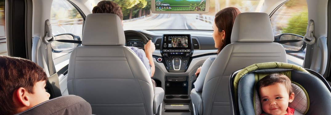 A family inside a 2020 Honda Odyssey