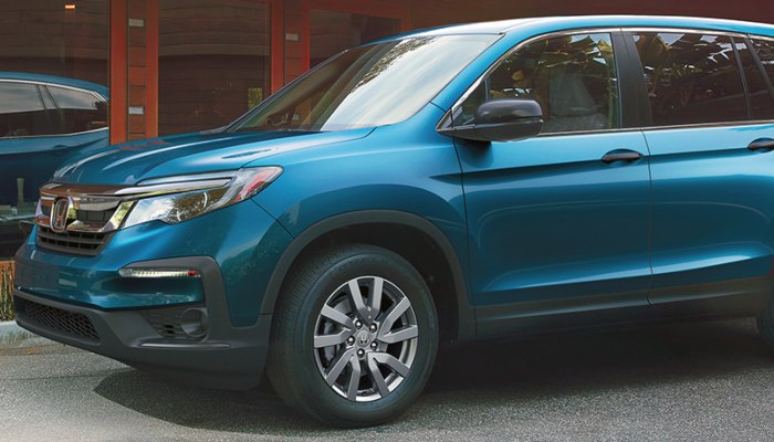 2020 Honda Pilot parked in front of a building
