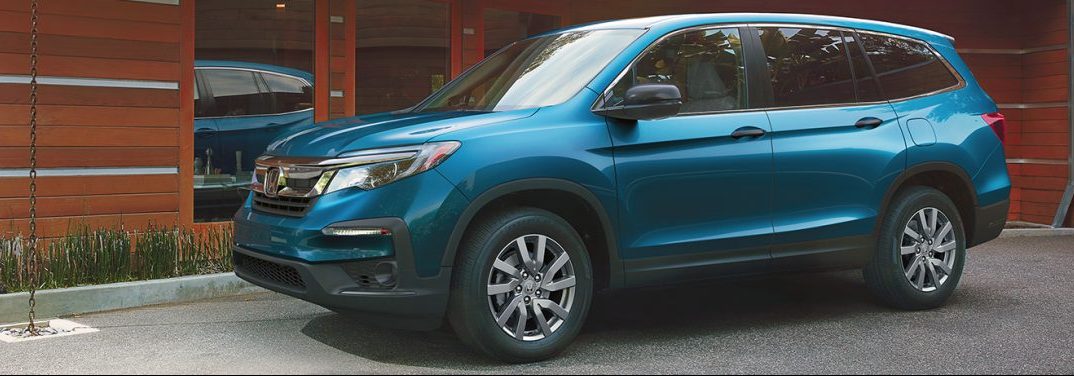 2020 Honda Pilot parked in front of a building
