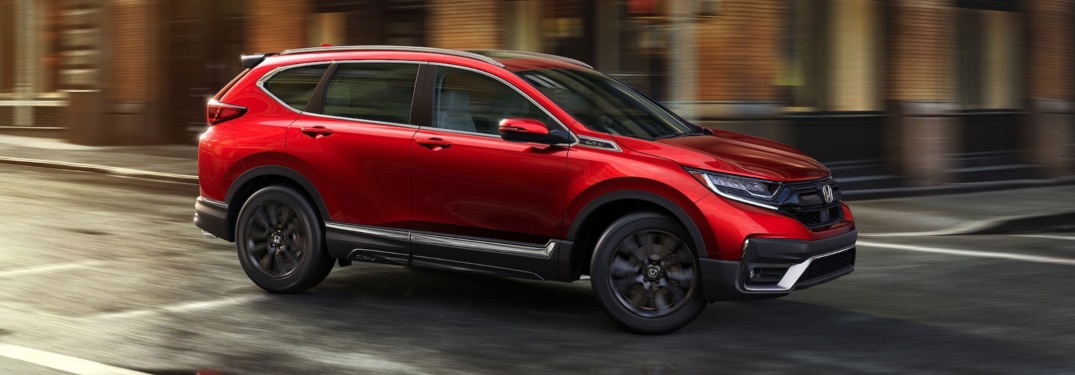 2020 Honda CR-V driving down a city street