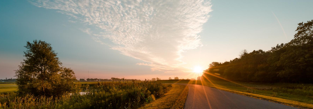 A rural road at sunset
