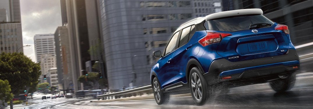 2020 Nissan Kicks driving down a city street