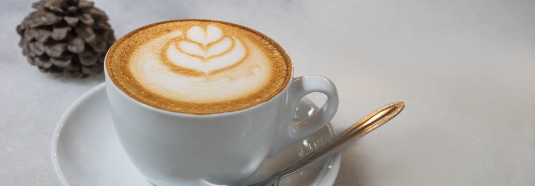 A cup of coffee on a table