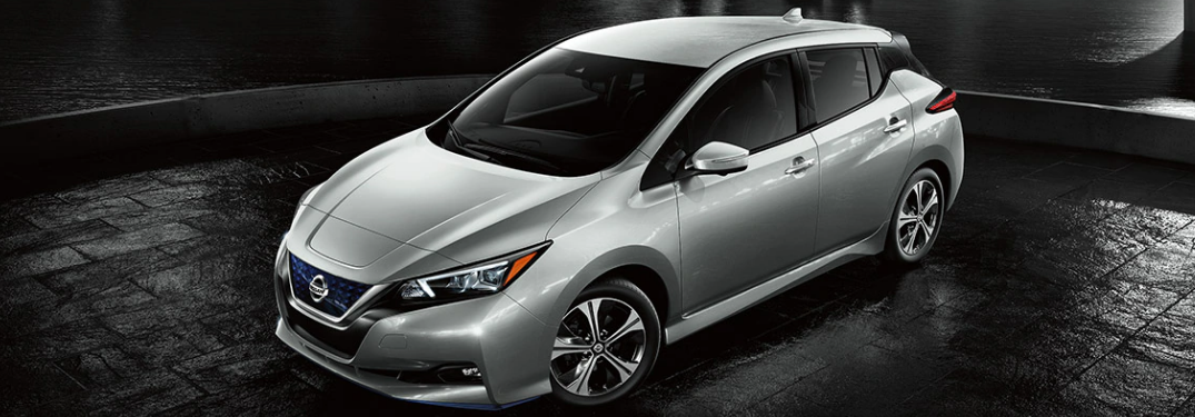 2020 Nissan LEAF driving down a city street