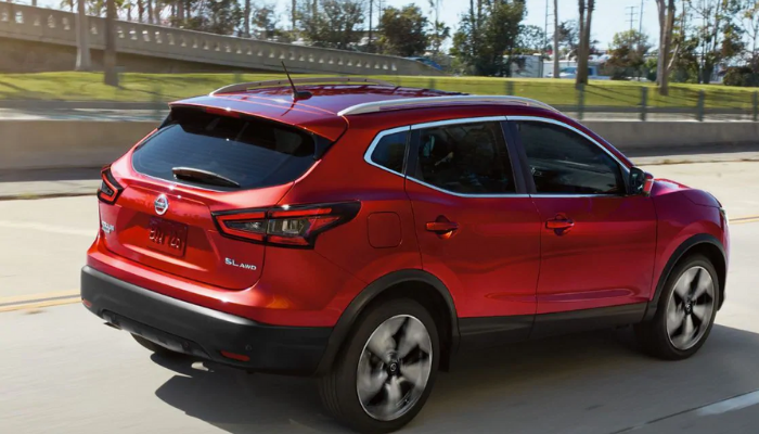 2020 Nissan Rogue Sport driving down a rural road