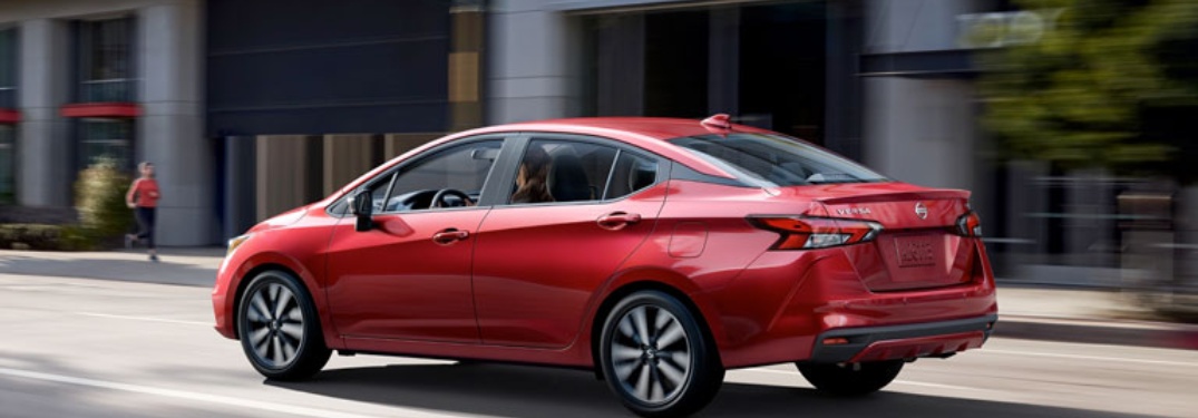 2020 Nissan Versa driving down a city street
