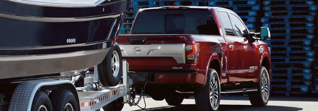A 2021 Nissan TITAN towing a boat