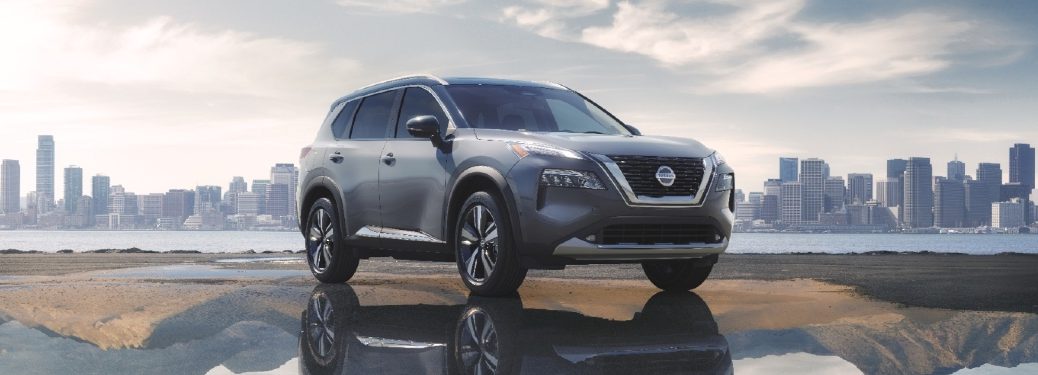 2021 Nissan Rogue parked in front of a city