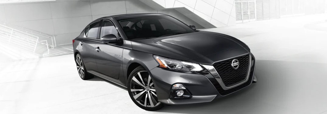 2021 Nissan Altima parked on a white tiled surface