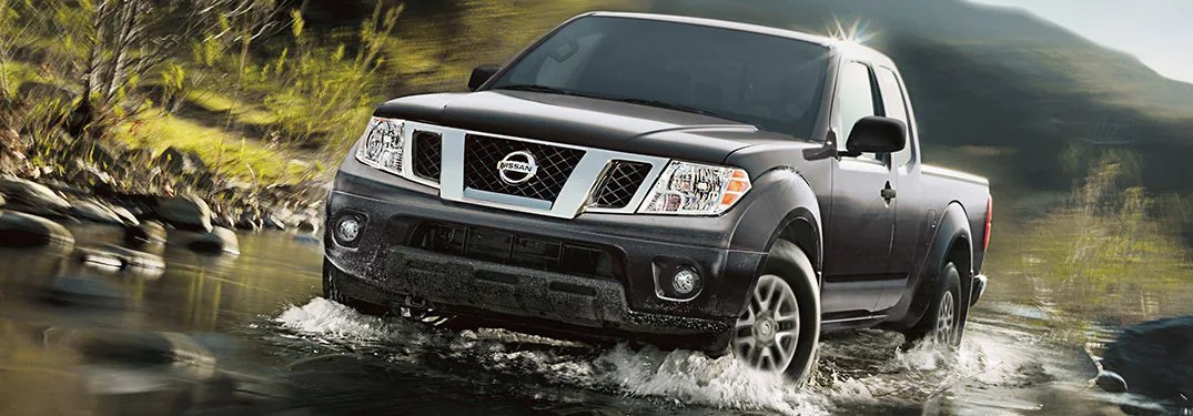 2021 Nissan Frontier driving through water