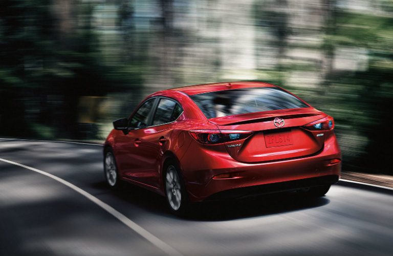 Red-2018-Mazda3-driving-on-curvy-road