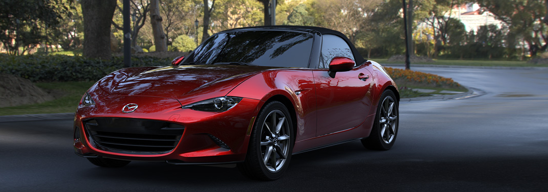 2020 Mazda MX-5 Miata driving down a rural road