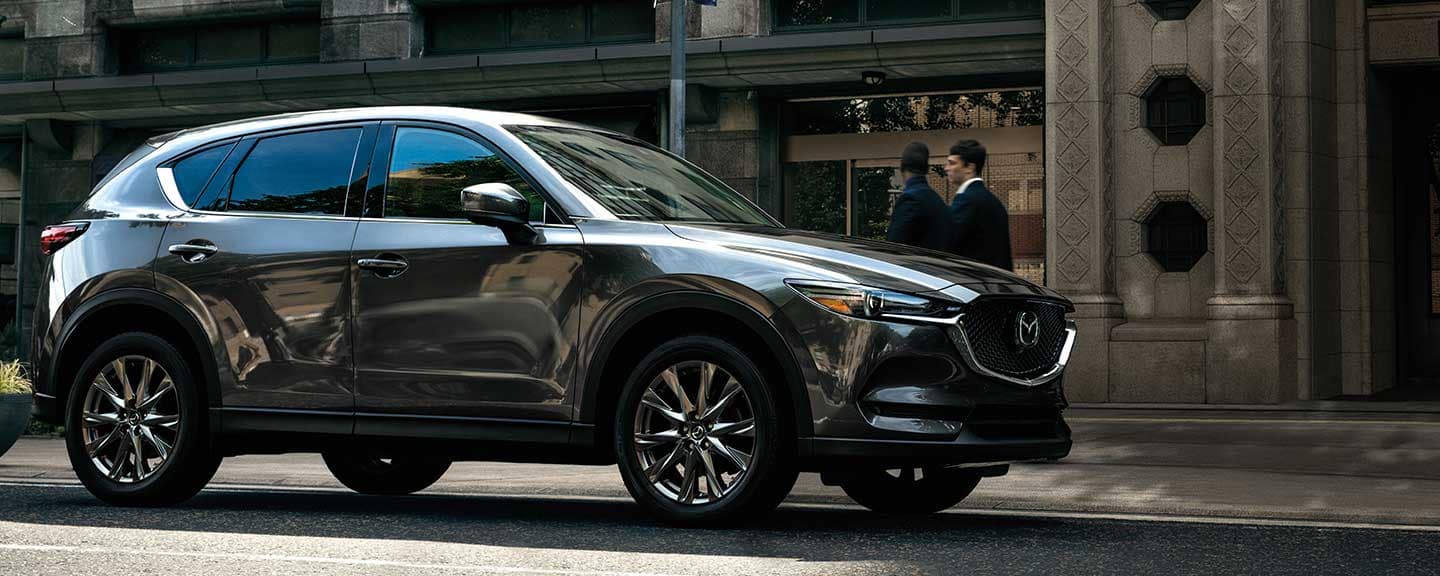 2020 Mazda CX-9 driving down a city street