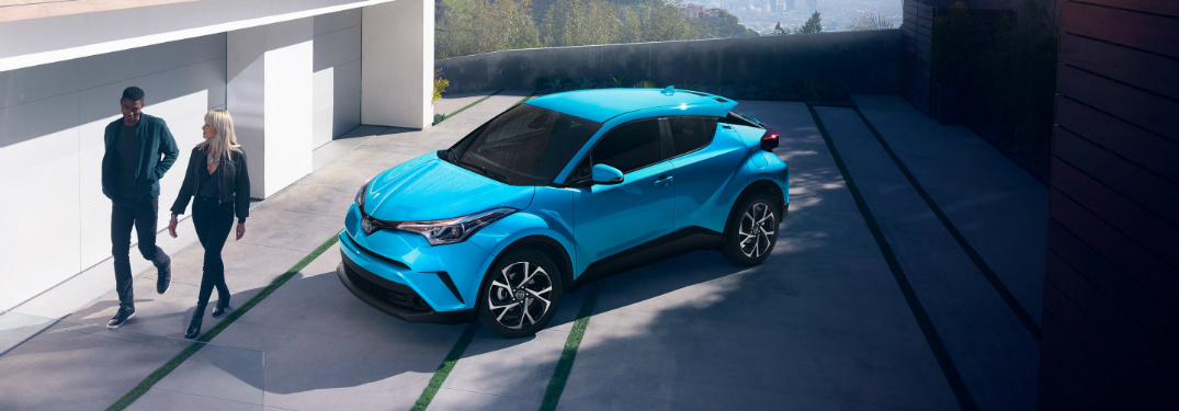aerial view of blue 2019 toyota c-hr in home driveway