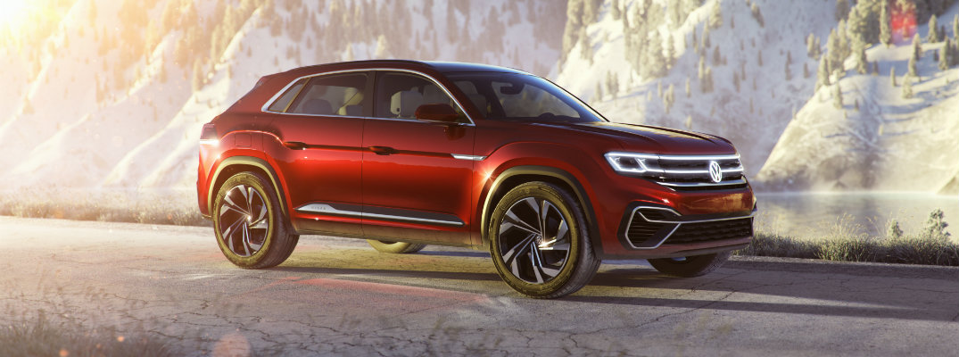 VW Atlas Cross Sport SUV concept new york international auto show still parked on snowy road with sunrise flares exterior side shot
