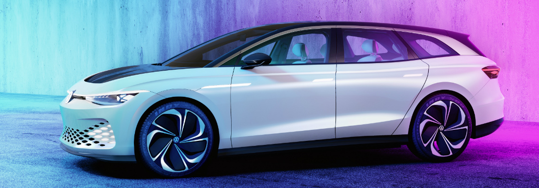 Side view of white Volkswagen ID. SPACE VIZZION
