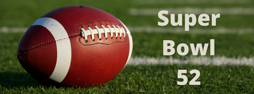 Super Bowl 52 written in white on Football Field Background with Football