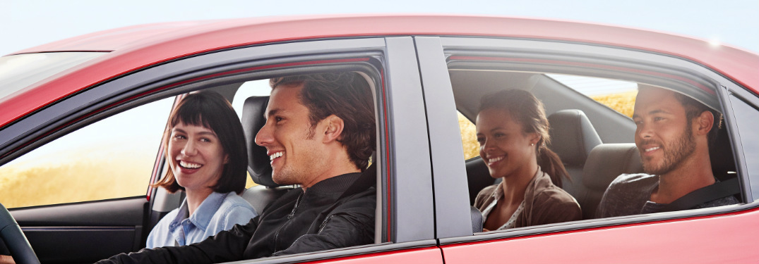 Four friends riding together in the 2019 Toyota Corolla