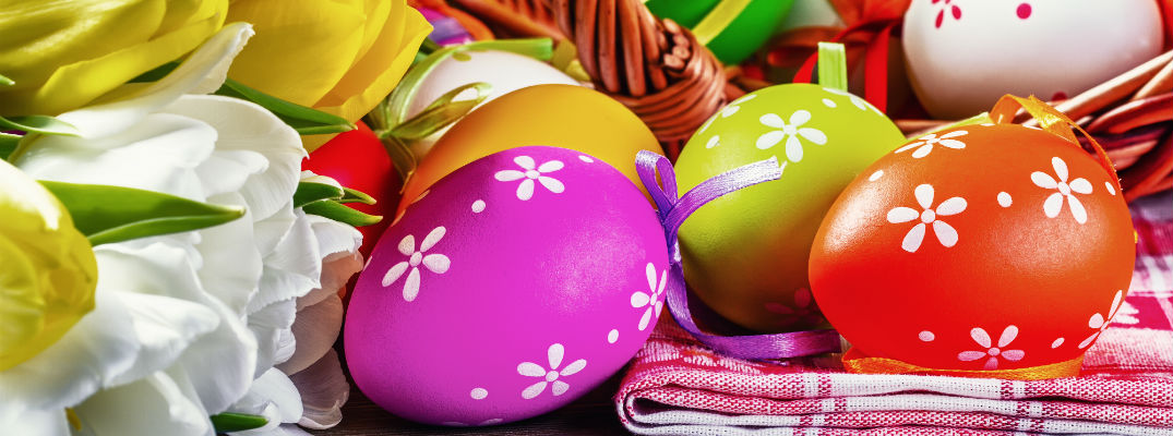 A stock photo of some Easter eggs in a basket.