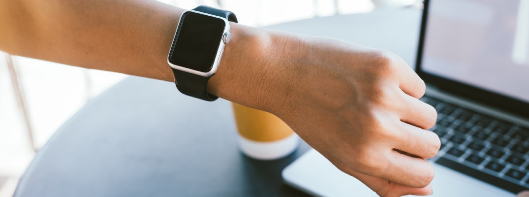 A stock photo of a person wearing a smartwatch.