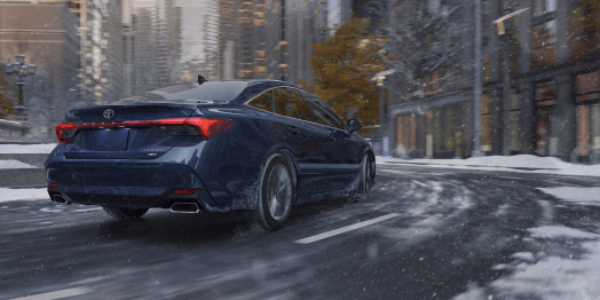AWD Toyota Avalon driving on snowy road