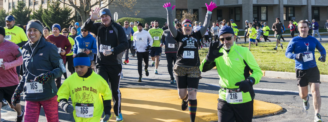 Group of runners participating in holiday run
