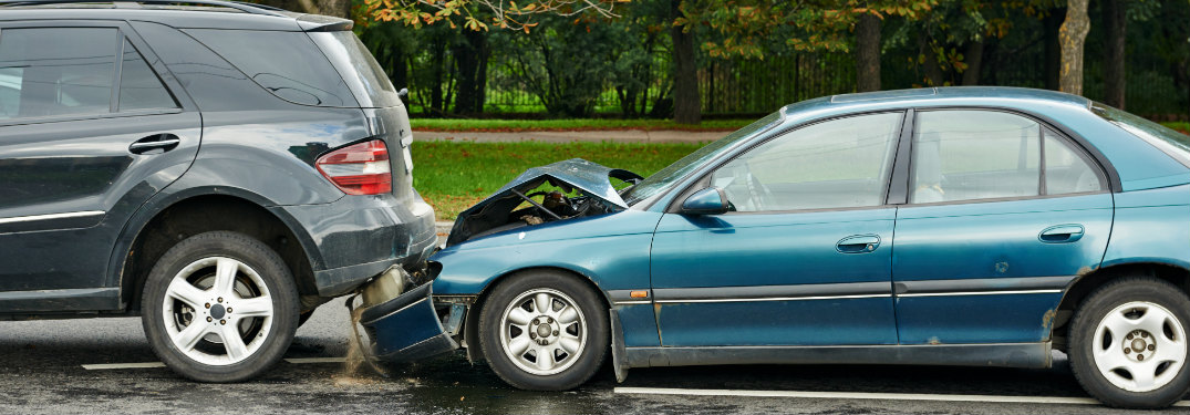 car and minivan in fender bender