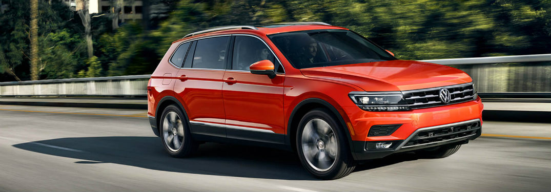 2018 Volkswagen Tiguan driving down the street